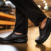 Managers in a restaurant wearing professional and comfortable restaurant shoes.