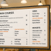Restaurant menu featuring an itemized menu with detailed pricing and clear descriptions.